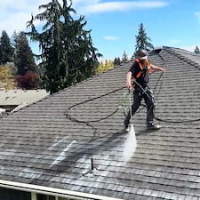 Removing-Moss-and-applying-Fresh-Roof-on-a-roof-in-Vancouver-Washington 0